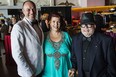 Marc Dubois, left, Shelley Sharpe and Dani Bobb attend the Windsor Symphony Orchestra gala at the Canadian Historical Aircraft Association on Saturday, June 6, 2015. (JESSELYN COOK/The Windsor Star)