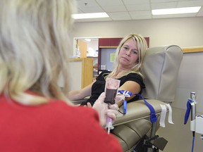 The Star's Kelly Steele faced her fears and donated blood for the first time on Tuesday. (JASON KYRK / The Windsor Star)