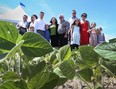 Windsor Regional Hospital president and CEO David Musyj joins the O'Keefe family for a portrait on their farm at County Road 42 and 9th Concession, which will be the home for the new regional mega-hospital.  (JASON KRYK/ The Windsor Star)