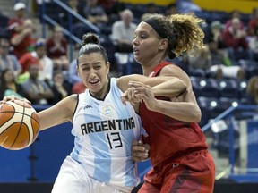 Miah-Marie Langlois and the women’s basketball team will play for the gold medal Monday after winning Sunday’s semifinal by a 91-63 count over Brazil. (CHRIS YOUNG/The Canadian Press)