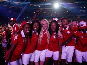 Canadian athletes enter the statdium for the closing ceremony on Day 16 of the Toronto 2015 Pan Am Games on July 26, 2015 in Toronto. Canada finished the Games with 217 medals, which broke the old record of 196 medals won at the 1999 Games in Winnipeg. (EZRA SHAW/Getty Images)