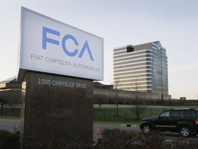 Fiat Chrysler could be required to lay out hundreds of millions of dollars to get potentially defective Ram pickups and older Jeeps off the road under a deal with U.S. safety regulators to settle claims that the automaker mishandled nearly two dozen recalls. (CARLOS OSORIO/The Associated Press)