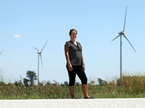 Essex Coun. Sherry Bondy, shown near a wind farm near Essex on Tuesday, July 28, 2015, is opposed to a new proposed wind farm in the area. (TYLER BROWNBRIDGE/The Windsor Star)