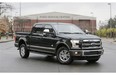 2015 Ford F-150 pickup truck at the Dearborn Truck Plant in Dearborn, Mich. America’s favorite truck, the Ford F-Series, was revamped from top to bottom for 2015, and the handsomely styled result shows how far pickups have come from their rough-riding and utilitarian past. (AP Photo/Carlos Osorio, File)