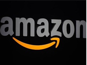 The Amazon logo during a press conference in New York. US online giant Amazon said March 30, 2015 it was launching a services marketplace offering to connect consumers with businesses offering anything from home improvement to piano lessons. Amazon Home Services, which is being launched in major cities across the United States, includes businesses in diverse areas such as gardening, computer repair, and math or yoga instruction.(Postmedia News files)