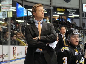 Trevor Letkowski stands behind the bench with the Sarnia Sting. (OHL Images)