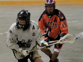 Windsor Clippers Andrew Garant, left, carries the ball against Six Nations Rebels Kessler Doolittle, right, in Western Conference playoff action from Forest Glade Arena Monday July 13, 2015. (NICK BRANCACCIO/The Windsor Star)