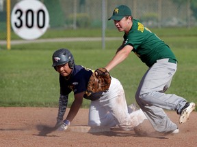 Walker Homesites Bantam Majors Ryley Vernon, left, breaks up a double play against LaSalle Bantam Minors Titans Mitch With at Walker Homesites Monday July 13, 2015. Vernon singled in the first inning.  (NICK BRANCACCIO/The Windsor Star)