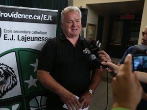 Mike Morencie announces AKO Fratmen Football Club has  moved to E.J. Lajeunesse for the 2015 OFC Football Schedule.  (JASON KRYK/The Windsor Star)