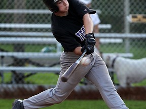 Tecumseh Thunder Juniors Casey Boutette singles with the bases loaded against Tecumseh Seniors at Lacasse Park Friday July 17, 2015. (NICK BRANCACCIO/The Windsor Star)