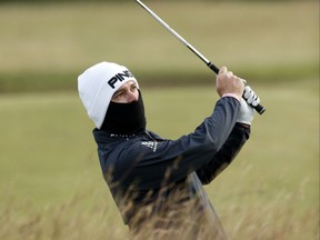 South Africa’ Louis Oosthuizen plays a shot on the 13th hole during the second round of the British Open Golf Championship at the Old Course, St. Andrews, Scotland, Saturday, July 18, 2015. (AP Photo/Jon Super)