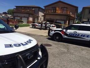 Windsor police converged on a Mercer Street home on Wednesday, July 15, 2015. (Tyler Brownbridge/The Windsor Star)