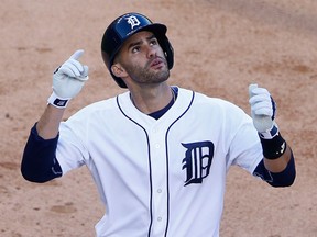 J.D. Martinez #28 of the Detroit Tigers celebrates after hitting a two run home run in the third inning of the game against the Seattle Mariners on July 21, 2015 at Comerica Park in Detroit, Michigan. (Photo by Leon Halip/Getty Images)
