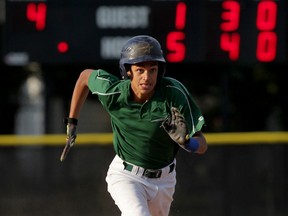 Windsor Stars Minors Stanley Dean steals third base against Riverside Bantam Minors in the third inning at Soulliere Field Thursday July 23, 2015.  (NICK BRANCACCIO/The Windsor Star)