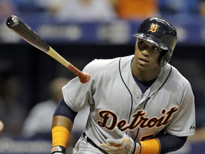 Detroit Tigers' Yoenis Cespedes flips his bat after hitting a home run off Tampa Bay Rays pitcher Nathan Karns during the seventh inning of a baseball game Monday, July 27, 2015, in St. Petersburg, Fla.  (AP Photo/Chris O'Meara)