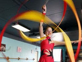 Amherstburg's Celine Labrecque practises her routine in rhythmic gymnastics at the Catz Meow Dance Education Centre in Amherstburg. (JASON KRYK/The Windsor Star)