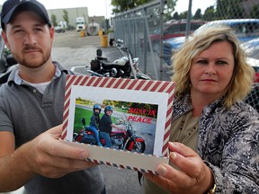 A collection box for donations and condolence cards for truck driver and motorcycle enthusiast Don Russell has been created by co-workers at Onfreight Logistics, a trucking firm on Patillo Road Friday July 31, 2015. Later, Onfreight will be mounting a memorial plaque where Russell would park his motorcycle.  (NICK BRANCACCIO/The Windsor Star)