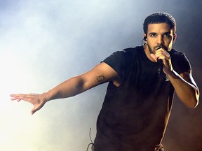 Rapper Drake performs onstage during day 3 of the 2015 Coachella Valley Music & Arts Festival (Weekend 1) at the Empire Polo Club on April 12, 2015 in Indio, California.  (Photo by Kevin Winter/Getty Images for Coachella)
