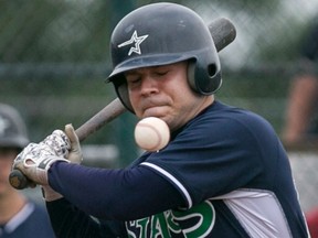 The Windsor Stars' Andrew Masote takes a ball high against the Macomb Monarchs at Cullen Field, Sunday, July 12, 2015.  (DAX MELMER/The Windsor Star)