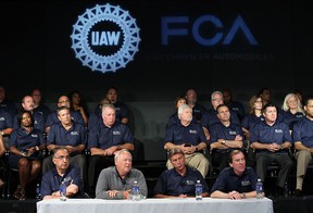 Sergio Marchionne, chairman and DEO, FCA US, (left) and Dennis Williams, president UAW, take part in a joint press conference to kick off the UAW-FCA labour talks at the UAW-Chrysler National Training Centre in Detroit on Tuesday, July 13, 2015.                         (TYLER BROWNBRIDGE/The Windsor Sta
