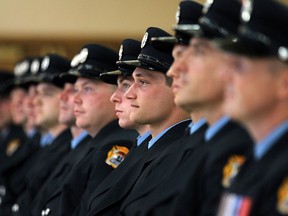 The newest firefighters to join the Windsor Fire Department take part in the recruit graduation ceremony at the Caboto Club in Windsor on Thursday, July 2, 2015. Twelve recruits graduated a received their new postings.                      (TYLER BROWNBRIDGE/The Windsor Star)