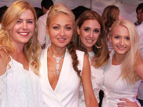 Julie Pinsonneault (left) Nayeli Castellanos, Carly Nicodemo, and Sandi Crystalball at the 2015 White Party at The Willistead Restaurant on July 11, 2015. (ALEX BROCKMAN/The Windsor Star)