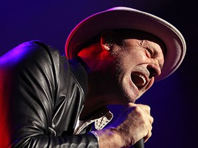 Gordon Dowie and the rest of the The Tragically Hip perform at Caesars Windsor in Windsor on Friday, July 3, 2015.                        (TYLER BROWNBRIDGE/The Windsor Star)