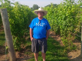 Martin Gorski, owner of North 42 Degrees Estate Winery, shows off his vineyard during the Explore the Shore event on Saturday, July 25, 2015. (Dane Wannairachige/The Windsor Star)