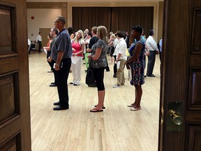 Potential job seekers pack the halls and corridors of the Caboto Club as they wait for their shot at 20 positions at the Hiram Walker distillery in Windsor on Thursday, July 30, 2015.                           (TYLER BROWNBRIDGE/The Windsor Star)