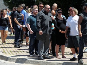 Job seekers pack the Caboto Club in this  July 30, 2015 photo.