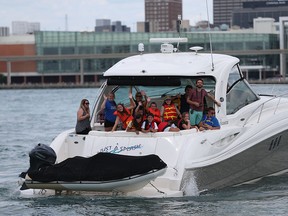 KIWANIS CAMP kids get a ride on luxury yachts from member of the Windsor Yacht Club on Wednesday July 22, 2015.   (JASON KRYK/The Windsor Star )