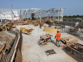 Construction is well underway on the second phase of the Atlas Tube Centre in Lakeshore on July 6, 2015, as local politicians and business leaders held a groundbreaking ceremony. The new facility will include will an indoor aquatic centre, splash pad, soccer fields and a skateboarding area.  (DAN JANISSE/The Windsor Star)