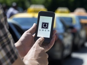 Uber, the peer-to-peer ride sharing app, launched in London, Ont. on Thursday July 23, 2015. Craig Glover/The London Free Press/Postmedia Network