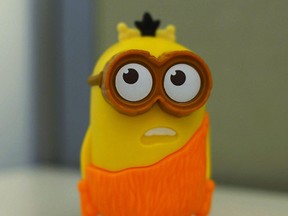 A "Minion" toy in New York, distributed in McDonald's restaurant's Happy Meals. The company says the talking toy is speaking only nonsense words and not something a little more adult. Experts say McDonald's may be right, and the fault may lie in how our brains are primed to find words even when they're not really there. (AP Photo/Patrick Sison)