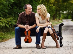 Canadian fiddler Natalie MacMaster (right) with her husband and fellow fiddler Donnell Leahy (left) in a promotional image. (Handout / The Windsor Star)
