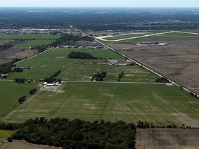 The proposed site for the new Windsor mega-hospital at the corner of County Road 42 and the 9th Concession is seen on July 15, 2015.  Windsor Airport is shown at the upper right.