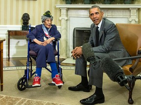 President Barack Obama meets with Emma Didlake, 110, of Detroit, the oldest known World War II veteran, Friday, July 17, 2015, in the Oval Office of the White House in Washington. (AP Photo/Evan Vucci)