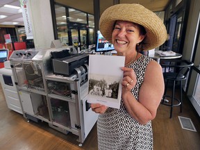 Dorothy Mahoney is shown at the Windsor Public Library with the Expresso Book Machine on Monday, July 20, 2015. She self published a book for her mother in law's 90th birthday. (DAN JANISSE/The Windsor Star)