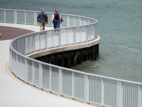 Files: A couple walk along the Detroit River in the recently renovated Coventry Gardens in Windsor on Tuesday, June 22, 2010.            (TYLER BROWNBRIDGE / The Windsor Star)