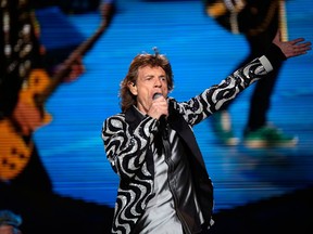 Mick Jagger of The Rolling Stones performs during their 2015 Zip Code Tour at Comerica Park on Wednesday, July 8, 2015 in Detroit. (Salwan Georges/Detroit Free Press via AP)