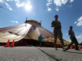 Workers raise the big top tent in preparation for the 2015 Shrine Circus at the WFCU parking lot in Windsor. This is the 252nd Anniversary of the Zerbini Family Circus. Since the humble start of the Zerbini Family Circus in Paris, France, in 1763 ten generations of Zerbinis have travelled the world sharing their talents with circus audiences on three continents. exciting new show including; Astounding Trapeze & Aerial Artistry, Jugglers, the Motorcycle Globe of Fire, Musical Comedy, the Zerbini cavalcade of Equus and Pachyderms, Classical Clowns, and much more. (JASON KRYK/The Windsor Star)