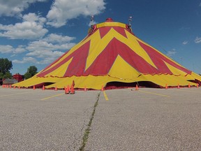 Workers raise the big top tent in preparation for the 2015 Shrine Circus at the WFCU parking lot in Windsor. This is the 252nd Anniversary of the Zerbini Family Circus. Since the humble start of the Zerbini Family Circus in Paris, France, in 1763 ten generations of Zerbinis have travelled the world sharing their talents with circus audiences on three continents. exciting new show including; Astounding Trapeze & Aerial Artistry, Jugglers, the Motorcycle Globe of Fire, Musical Comedy, the Zerbini cavalcade of Equus and Pachyderms, Classical Clowns, and much more. (JASON KRYK/The Windsor Star)