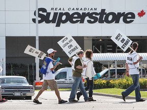 Unionized workers at the Real Canadian Superstore on Dougall Ave. in Windsor, ON. walk the picket line on Thursday, July 2, 2015. (DAN JANISSE/The Windsor Star)