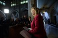 Minister of Transport Lisa Raitt speaks during a press conference in the foyer of the House of Commons on Parliament Hill in Ottawa on Friday, February 20, 2015. (THE CANADIAN PRESS/Sean Kilpatrick)