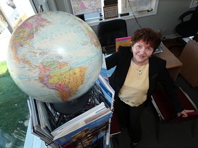 Travel agent Maria Voros from Complete Travel Windsor in Windsor on Thursday, July 2, 2015. Voros was happy to hear Air Transat will be flying out of Windsor this winter.                      (TYLER BROWNBRIDGE/The Windsor Star)