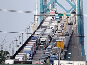 Traffic backs up entering Canada across the Ambassador Bridge between Windsor, Ontario and Detroit Michigan on July 24, 2015.   (JASON KRYK/The Windsor Star)