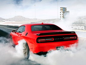 Consumer Reports magazine says this about the 2015 Dodge Challenger: "It snarls and grip in corners like a Rottweiler with a rib-eye steak." (Courtesy of Chrysler)