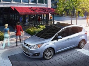 This image made available by Ford shows the 2015 Ford C-MAX Energi. The C-Max is sold as either a plug-in hybrid with onboard gasoline engine or as a non-plug-in hybrid with a gasoline four-cylinder supplemented by onboard-generated electric power.