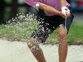Thomas DeMarco hits out of the bunker while taking part in the Jamieson Golf Tour at Beach Grove Golf and County Club in Tecumseh on Monday, August 10, 2015.                         (TYLER BROWNBRIDGE/The Windsor Star)