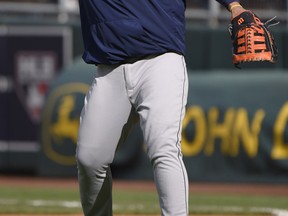 Miguel Cabrera #24 of the Detroit Tigers throws a ball during batting practice prior to a game against the Kansas City Royals at Kauffman Stadium on August 10, 2015 in Kansas City, Missouri. (Photo by Ed Zurga/Getty Images)